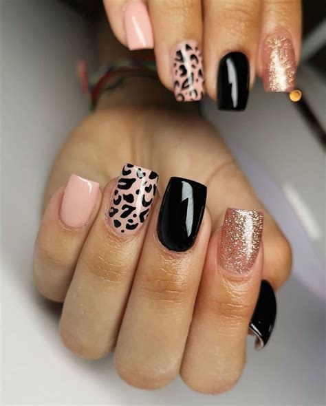 black leopard print nail designs.